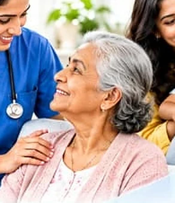 A caregiver assisting while family members take a break